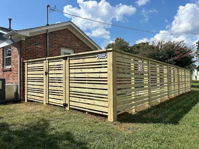 Horizontal wood privacy fence and gate installed in Columbia, TN